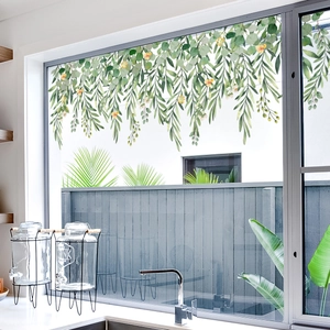 Creative green hanging plant window stickers with small yellow flowers on clear glass