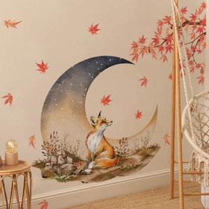 Cozy room scene featuring moon and fox wall stickers with scattered red autumn maple leaves