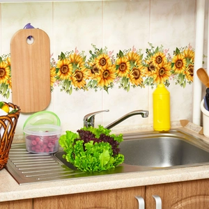 Macro view of sunflower waistline stickers on kitchen tile wall with vibrant floral pattern