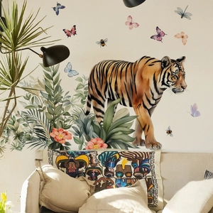 Realistic watercolor tiger wall decal with tropical leaves and butterflies in a nursery