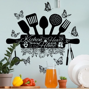 Minimalist black kitchen wall sticker with cutlery icons and the heart of the home quote