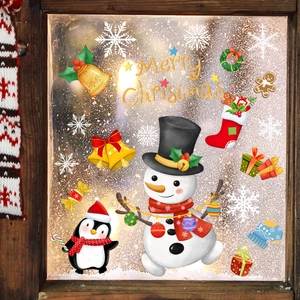 Festive Christmas window stickers set with snowman, penguin, and Merry Christmas text decor