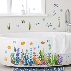 Colorful watercolor ocean themed wall decals featuring tropical fish and seaweed for bathroom