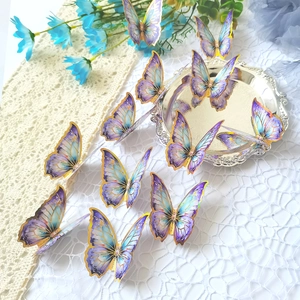 Pegatinas 3D de mariposas con bordes dorados y degradado violeta-azul para decoración