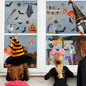 Ghost and pumpkin Halloween window clings on glass with children watching stickers