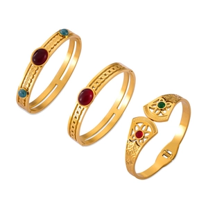 Bracelets vintage en acier inoxydable doré ajourés avec incrustations de gemmes