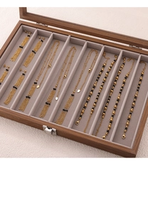 Brown wooden jewelry box with glass lid showing agate beaded tassel earrings and necklaces