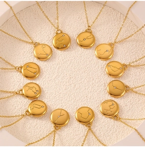 Detailed display of twelve golden zodiac coin necklaces with micro-inlaid zircon constellations
