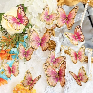 Set of 12 3D pink and orange butterfly wall stickers with golden edges for home decor