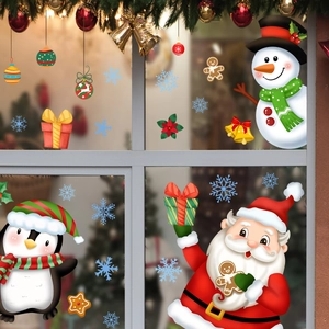 Christmas window decals with Santa Claus, snowmen, and snowflakes on a glass window pane