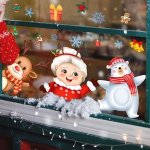 Christmas window clings set featuring cartoon reindeer, polar bear and festive snowflakes