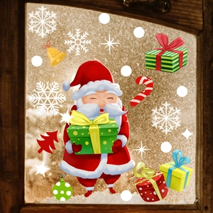 Detailed view of Christmas window stickers featuring Santa Claus, gift boxes, and snowflakes