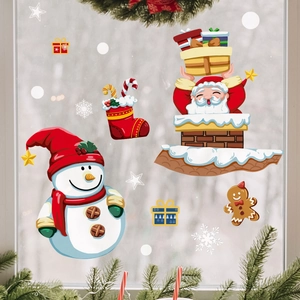 Detail of Christmas window stickers featuring Santa Claus and snowman on glass