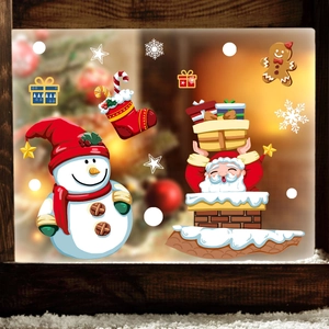 Christmas window decals set featuring Santa, snowman and snowflakes on glass window