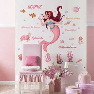 Watercolour mermaid wall decal set with sea creatures and bubbles in a kid's room