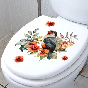 Self-adhesive floral bird wall sticker shown on a white toilet lid in a bathroom