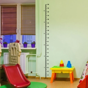 Minimalist black wall-mounted height growth chart for kids room with 0-200cm scale