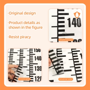 Close-up of waterproof kids height chart showing clear scale markers and material texture