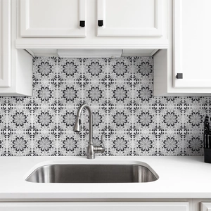 Waterproof kitchen tile sticker with vintage grey mandala pattern on a white marble wall