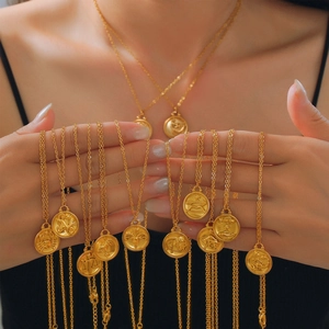 Gold zodiac coin pendant necklace in polished stainless steel with embossed constellations