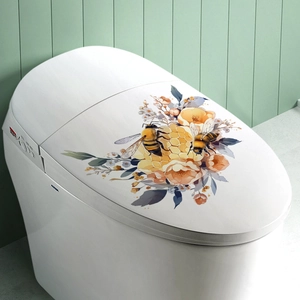 Adesivo murale con ape e fiore arancione su coperchio del water bianco per decorazione