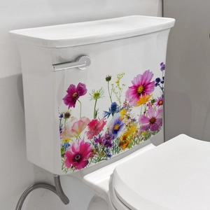 Detail of colorful floral toilet stickers on a white ceramic tank for home decoration