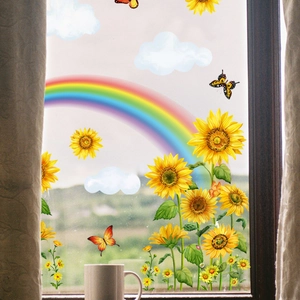 Detail of sunflower, rainbow and butterfly double-sided window stickers on glass
