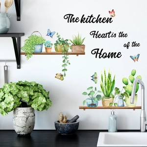 Detalle de vinilo de cocina con plantas acuarela, mariposas y frase corazón del hogar