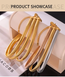 Detailed view of flat triple layer snake bone chokers in gold, rose gold and silver