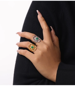 Detailed close-up of a vintage octagonal star ring with green natural stone inlay