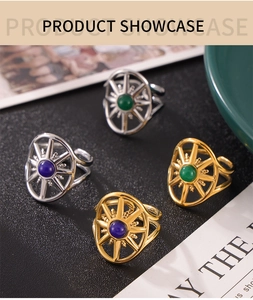 Macro detail of retro starburst rings with blue and green stones in gold and silver