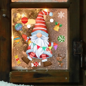 Close-up of Christmas gnome static window stickers with colorful festive decorations