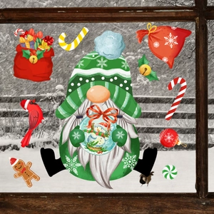 Detailed view of Santa gnome window stickers set with snowflakes and candy canes on glass