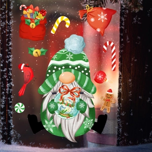Detailed view of Christmas window stickers featuring a festive gnome and candy cane decals