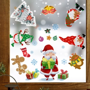 Detailed Santa Claus and Reindeer static window decals set against a winter glass background