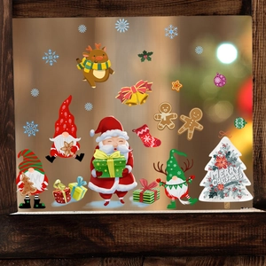 Christmas window decals set featuring Santa Claus, gnomes and reindeer on glass window