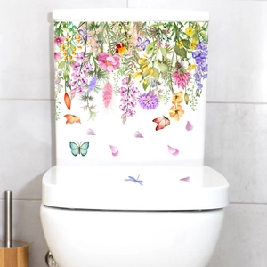 Détail de stickers pour WC aux motifs de pivoines roses et papillons aquarelle