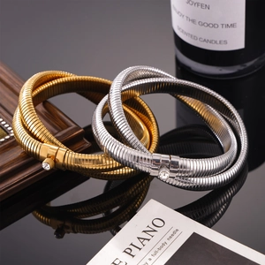 Titanium steel 18K gold plated spiral snake bracelet set with sparkling zircon crystals