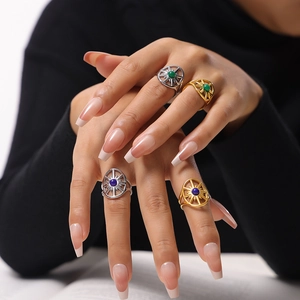 Vintage sunburst rings with natural stones in gold and silver finish on model hands