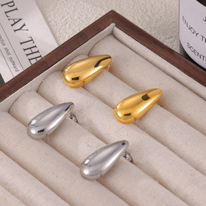 Polished water drop titanium steel earrings in gold and silver finish set in a wooden box