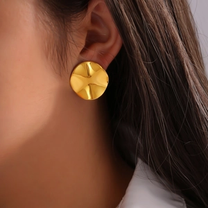 Elegant 18k gold plated titanium earrings with minimalist wavy circular convex design