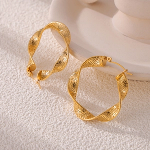 Chic twisted U-shaped titanium steel gold hoop earrings with embossed geometric textures