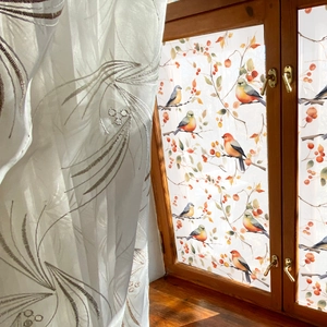 Bird on branches privacy window film with red berries and frosted decorative finish