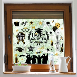 Black and gold 2024 graduation window static clings featuring caps and balloons