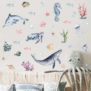 Detail of watercolor ocean animal wall stickers with blue whale and coral for home decor