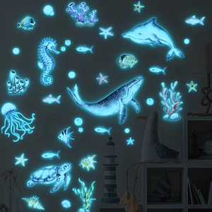 Glow in the dark ocean animal wall stickers featuring whales and sea turtles