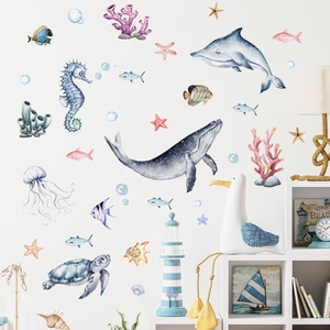 Detailed watercolor ocean wall decals showing whales, turtles and corals on white wall