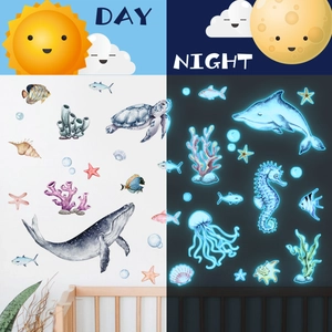 Glow in the dark ocean wall stickers featuring whales and dolphins for nursery decor