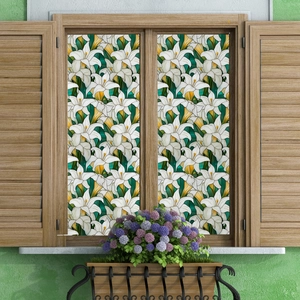 Static cling window film featuring fresh white lily patterns on wooden window frame