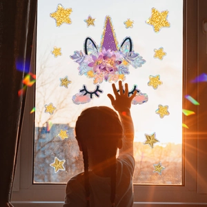 Rainbow unicorn castle window sticker showing magical colorful light refraction on glass
